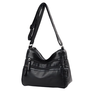 Practical black soft faux leather crossbody bag with multiple zippers for middle-aged women