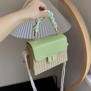 Straw woven handbag with green leather flap and pleated cloud handle for women