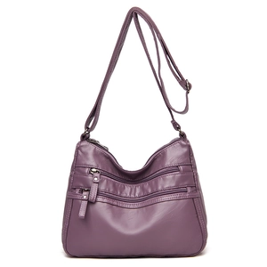 Elegant purple soft PU leather crossbody bag with multiple zippers and adjustable strap