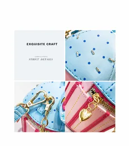 Exquisite craft detail of a cupcake bag showing heart zipper and blue polka dots
