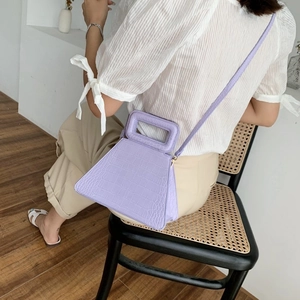 Purple crocodile pattern trapezoid handbag for women with a structured top handle design