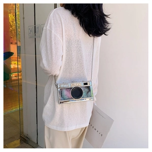 Fashionable vintage camera-shaped crossbody bag with silver chain and colorful feathers