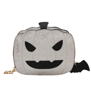 Sparkly silver pumpkin crossbody bag with black bat charm and gold chain for Halloween