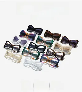 Detail shot of stylish oversized polygon sunglasses in multiple fashion-forward colors