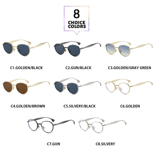 Grille de lunettes de soleil rondes en métal en huit couleurs sur fond blanc