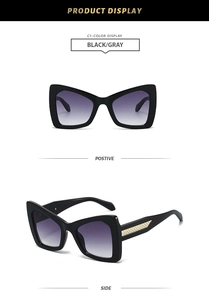 Front and side view of black oversized cat eye sunglasses with gold woven temples