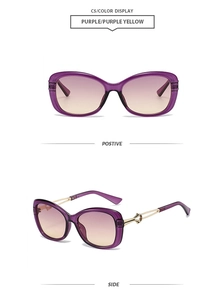 Detail view of purple butterfly frame sunglasses with gold-tone hollow temples