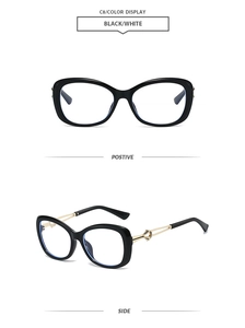 Detail view of butterfly frame sunglasses featuring unique gold twisted metal temples