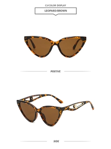 Détail de lunettes œil de chat à monture léopard et branches métalliques avec perles