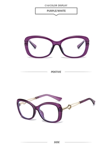 Detail view of purple cat-eye sunglasses with gold hollow temples and translucent frame