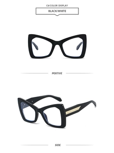 Detail of stylish oversized black sunglasses with luxury gold mesh metal temples
