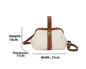 Detailed view showing bag dimensions 21cm width, 15cm height, and 11cm thickness