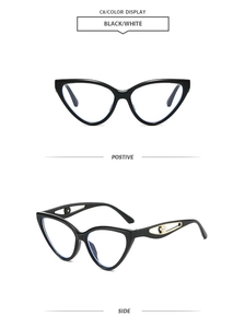 Détail de lunettes œil-de-chat noires avec découpe en métal et perle sur la branche