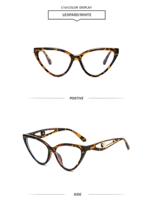 Détail de lunettes œil-de-chat léopard avec branche métallique ornée d'une perle