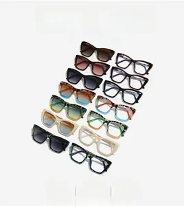 Detailed close-up of multiple polygonal oversized sunglasses in various colors and gradients