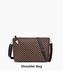 Close-up of retro geometric print shoulder bag with gold clasp and leather strap