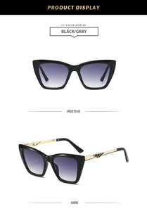 Detailed views of black cat-eye sunglasses with gradient lenses and gold geometric temples