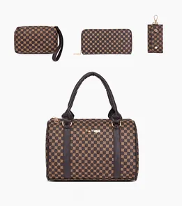 Detail view of the 4-piece handbag set including satchel and wallet with ring pattern