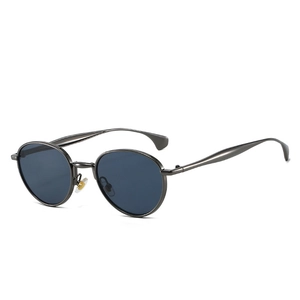 Lunettes de soleil rétro à monture ronde en métal gris fusil avec verres teintés sombres