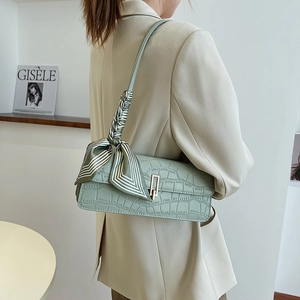 Light green crocodile pattern baguette bag with silk scarf and gold metal lock