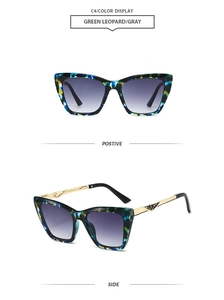 Detail of green leopard print cat eye sunglasses with gold hollow geometric temples