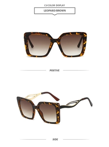 Detail of leopard print square sunglasses with golden metal hollowed-out temples