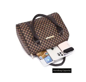 Detail view of large capacity vintage brown Boston bag showing interior storage for iPad