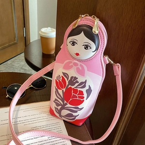 Detailed view of Matryoshka doll PU leather crossbody bag with floral patterns