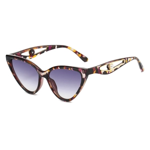 Lunettes de soleil œil de chat à monture multicolore avec détails en perles sur les branches