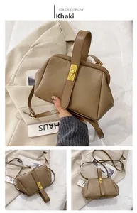 Khaki leather shell handbag with gold clasp, top handle and adjustable crossbody strap