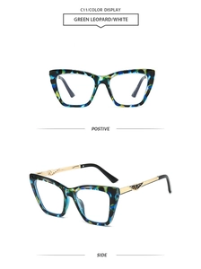 Detail of green leopard marble cat-eye sunglasses with gold hollow carved metal temples