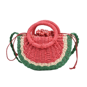 Handmade watermelon shaped straw tote bag with red drawstring lining for summer beach holidays
