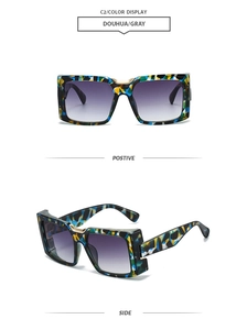 Detail of square marble frame sunglasses with grey gradient lenses and side view design