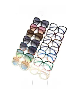 Collection of oversized square sunglasses in sixteen diverse colors and trendy gradients