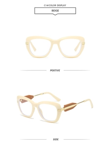 Detail view of beige polygon sunglasses with gold metal arms and thick frame accents