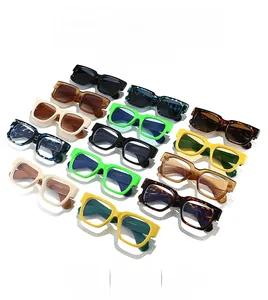 Flat lay of vintage square thick-frame sunglasses in multiple trendy colors and lenses