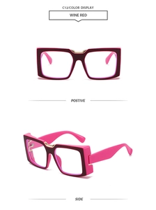Macro view of square wine red sunglasses with pink arms and gold metal bridge detail