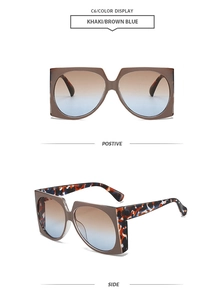 Vue détaillée des lunettes de soleil carrées kaki avec verres dégradés et branches marbrées