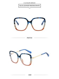 Detail view of square blue leopard pattern frames with elegant gold metal temples