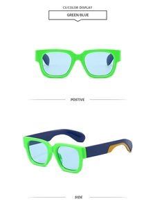 Detail view of square color-block sunglasses in green and blue with side profile display