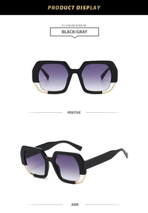 Detailed front and side views of black polygonal oversized sunglasses with gold accents