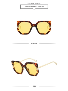 Front and side view of tortoiseshell oversized sunglasses with yellow lenses