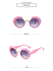 Pink geometric chunky sunglasses with gray gradient lenses and gold bridge detail