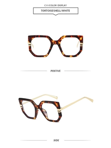 Detail view of tortoiseshell oversized frames with slim gold metal temples model C11
