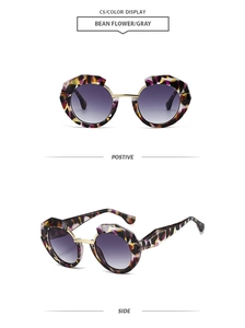 Detail view of tortoiseshell polygon sunglasses with purple gradient lenses and metal hinges