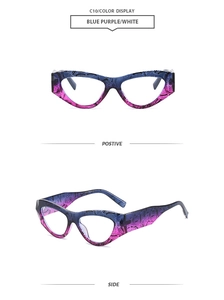 Detail view of blue and purple gradient cat-eye sunglasses with unique wavy patterns