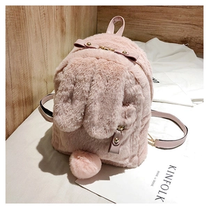 Detailed view of pink plush bunny backpack with long ears and fluffy pom-pom tail