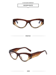 Detail view of cat eye sunglasses showing brown and white tortoise texture in model C14