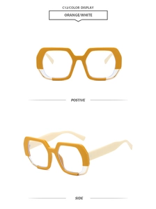 Detail of trendy geometric oversized sunglasses in contrasting orange and white frame