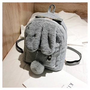Close-up of gray plush bunny backpack with long ears and fuzzy pompom tail detail